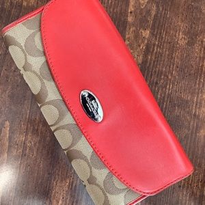 Orange/brown coach wallet